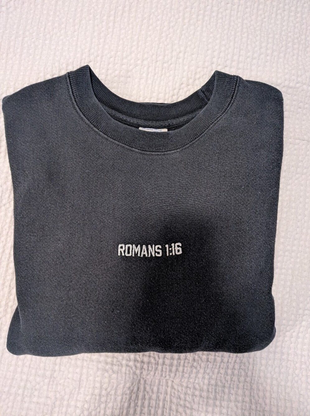Champion Black Sweatshirt with White "ROMANS 1:16" Embroidery
